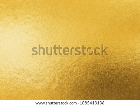 Gold texture background metallic golden foil or shinny wrapping paper bright yellow wall paper for design decoration element Royalty-Free Stock Photo #1085413136