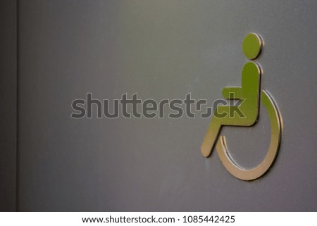 disabled sign on toilet door