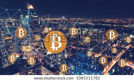 Bitcoin with the New York City skyline at night