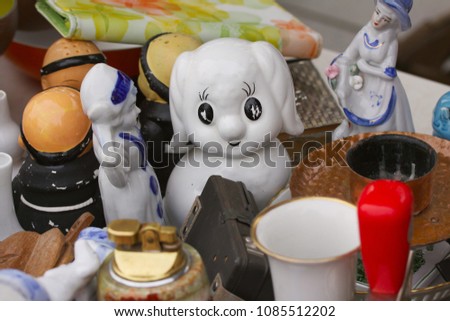 Scene from Flea market where people sell and buy used toys, clothes, pictures, kitchen ware and other vintage things