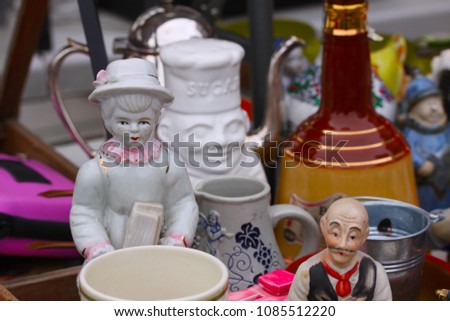 Scene from Flea market where people sell and buy used toys, clothes, pictures, kitchen ware and other vintage things