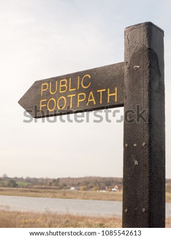 close up of black wooden public footpath sign way trail; essex; england; uk
