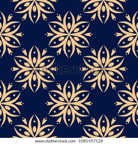 Golden floral ornament on dark blue background. Seamless pattern for textile and wallpapers