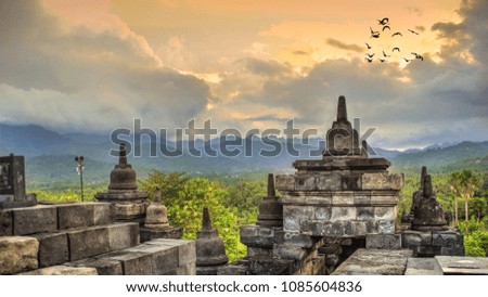 The other side of Borobudur Temple, Central Java, Indonesia.

This magnificent temple is surrounded by beautiful mountains