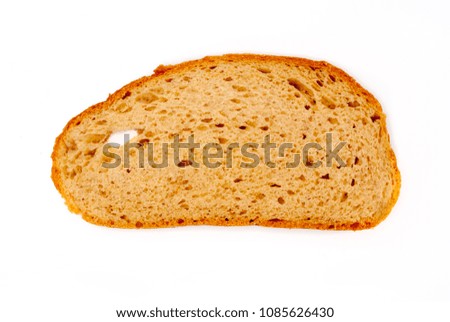 Detailed close-up of sliced grain bread on white background