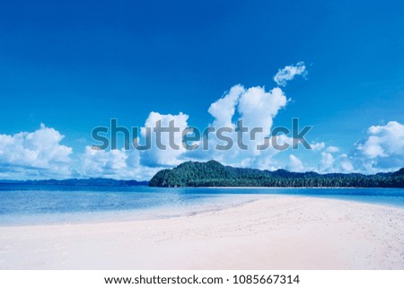 Vacation in paradise. Beautiful landscape with white sand tropical beach.