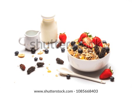 Healthy Breakfast corn flake with berries and milk isolated  on white background
