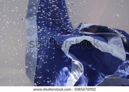 scarf and bubbles in water
