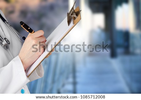 Doctor at hospital working with tablet