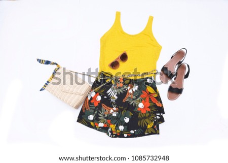floral,jeans shorts and bag, shoes ,yellow vest,sunglasses -white background 


