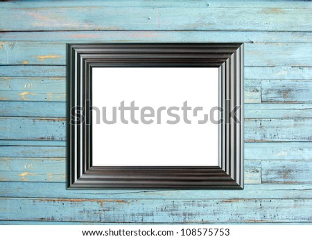 Black Vintage picture frame, wood plated, blue wood background, clipping path included