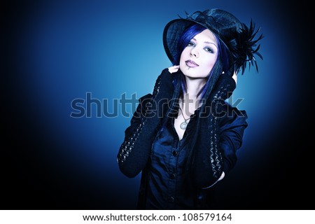 Portrait of a grunge girl over black background.
