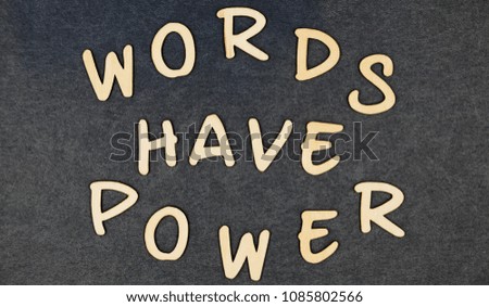 Words have power on wooden words blocks.	