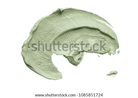 Cosmetic mud mask smear isolated on white background. Top view, closeup texture of blue facial clay, copy space Royalty-Free Stock Photo #1085851724