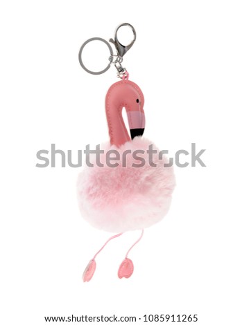 beautiful key chain luxurious fur ball-pink-colored animal isolated on white background Royalty-Free Stock Photo #1085911265