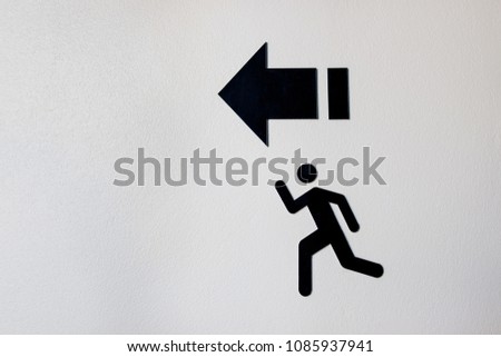 Sign of man toilet on white cement wall background.