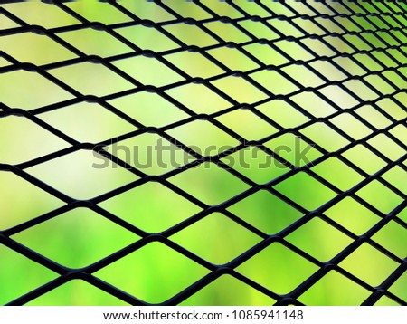 Black steel mesh, light green background, white insert.
Looking like a never-ending diagonal.
