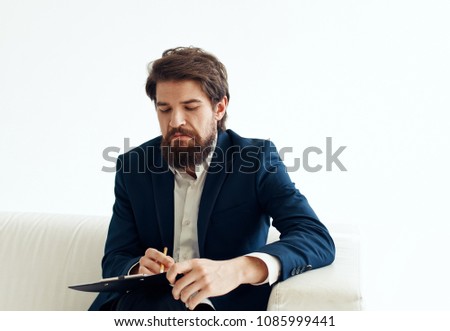  business man sitting on the couch, work                              