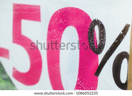 50 percent discount on storefront in pink black style closeup