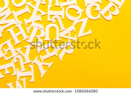The letters are scattered in disarray. English letters.