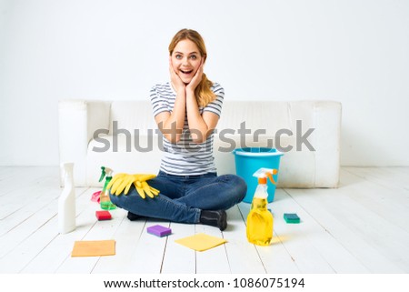   joyful housewife, apartment cleaning                             