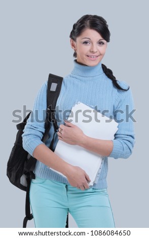 Beautiful female   student posing isolated on a white background