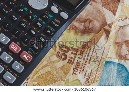 Turkish money and calculator on a table. Financial concept. 
