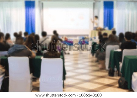 
Abstract blurred photo background of business people in conference hall or seminar room.
Bokeh business meeting conference training learning coaching concept.
