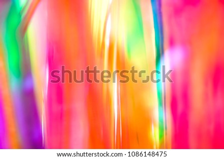 Abstract digital rainbow gradient retro 90s party festival wallpaper of vertical psychedelic multicolored rainbow neon lines with glowing light Royalty-Free Stock Photo #1086148475