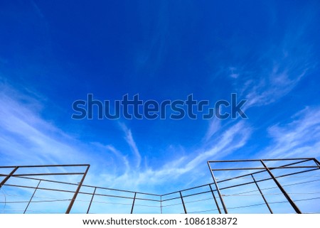 abstract detail of an architectural structure with blue sky background