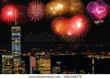 Fireworks over the Statue of Liberty and Manhattan bay