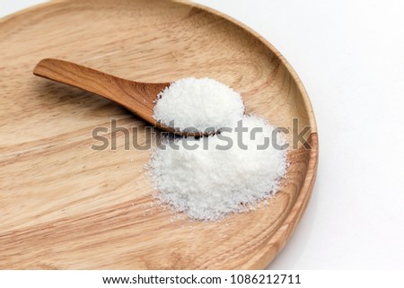 organic coconut flour on wooden tray isolated white background 