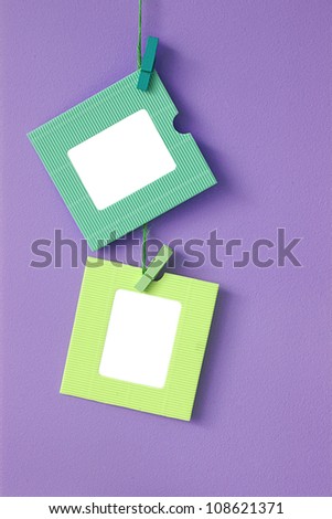 2 paper frames on the wall background