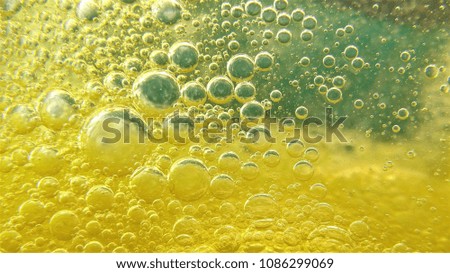 Bubbles in a bathtub on green background