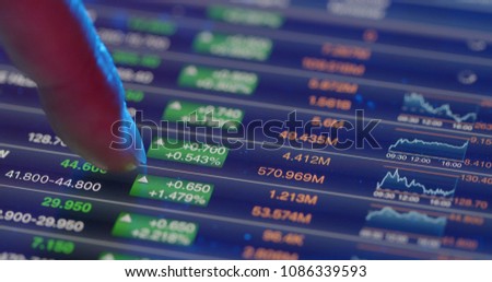 Stock market analysis on digital tablet 