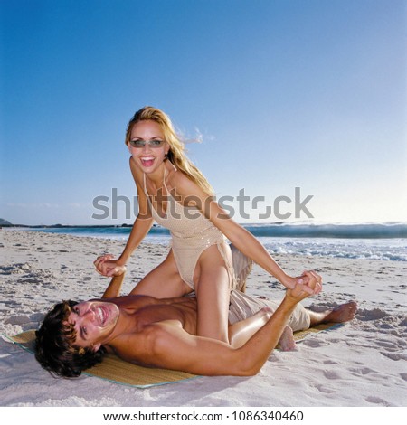 Romantic man and woman on beach