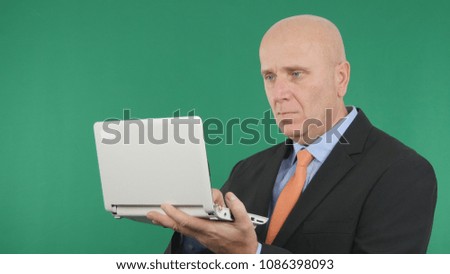 Confident Businessman Working With Laptop Green Screen In Background 
