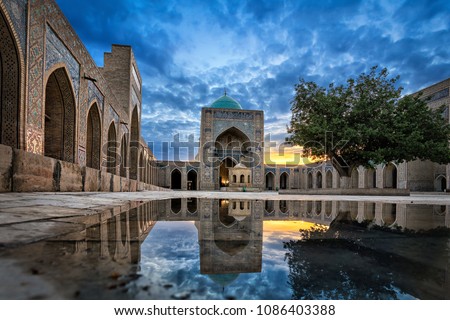 Inner courtyard of the Kalyan Mosque, part of the Po-i-Kalyan Complex in Bukhara, Uzbekistan Royalty-Free Stock Photo #1086403388