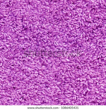 Seamless photo texture of  bright carpet fragment