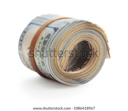 rolled stack of US dollars isolated on white background
