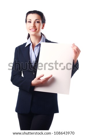 Attractive business woman showing your message on paper sheet. Isolated on white background