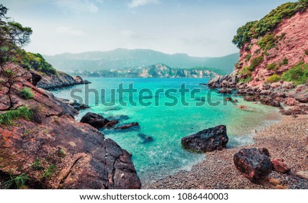 Wonderful spring view of Limni Beach Glyko. Colorful morning seascape of Ionian Sea. Picturesque outdoor scene of Corfu island, Greece, Europe. Beauty of nature concept background. 