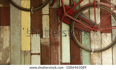 Retro Old Bike on Colorful Wood Wall