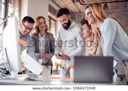 Team of young engineers working together in a architect studio.Start up business. Royalty-Free Stock Photo #1086473348