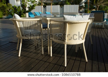 Outdoor table set with umbrella in the terrace