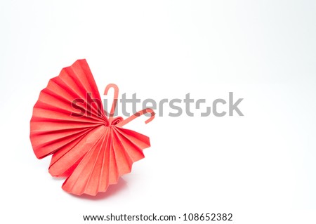 Origami Japanese red paper butterflies on white background.