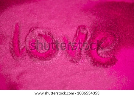 word love in hot pink glitter background texture