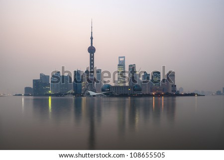 shanghai skyline and huangpu river at dawn