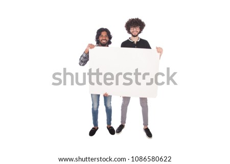 Full-length shot of two men standing and holding a white billboard in a Horizontal pose, isolated on a white background.