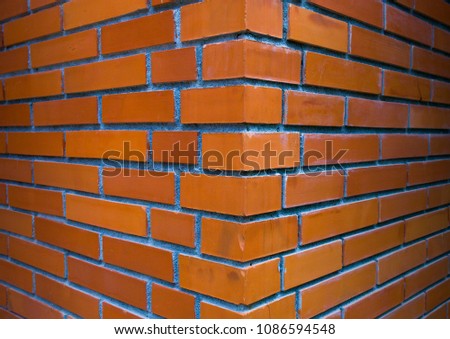 Orange brick wall background in rural room
